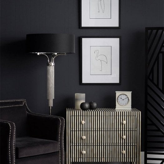 Floor standing lamp situated in a stylish front room