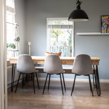 Dining room with a contemporary design with dining chairs and table