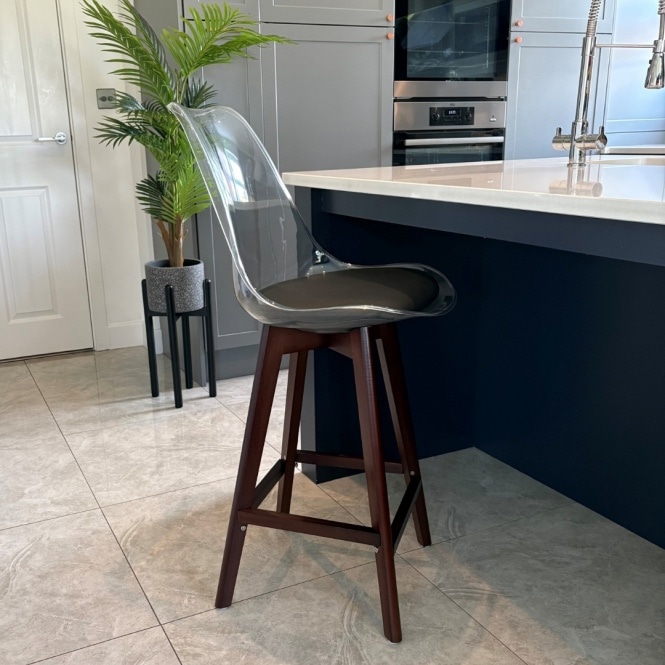 Fusion Living Soho Clear and Black Plastic Bar Stool with Dark Wood Legs