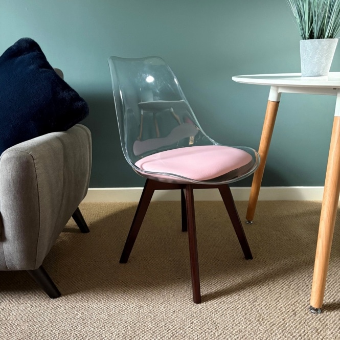 Fusion Living Soho Clear and Blush Pink Plastic Dining Chair with Squared Dark Wood Legs