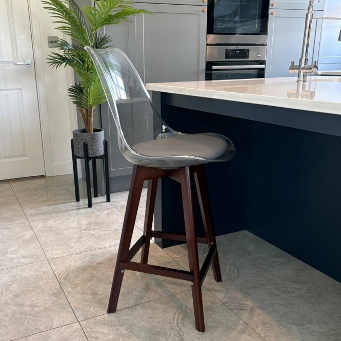 Fusion Living Soho Clear and Dark Grey Plastic Bar Stool with Dark Wood Legs